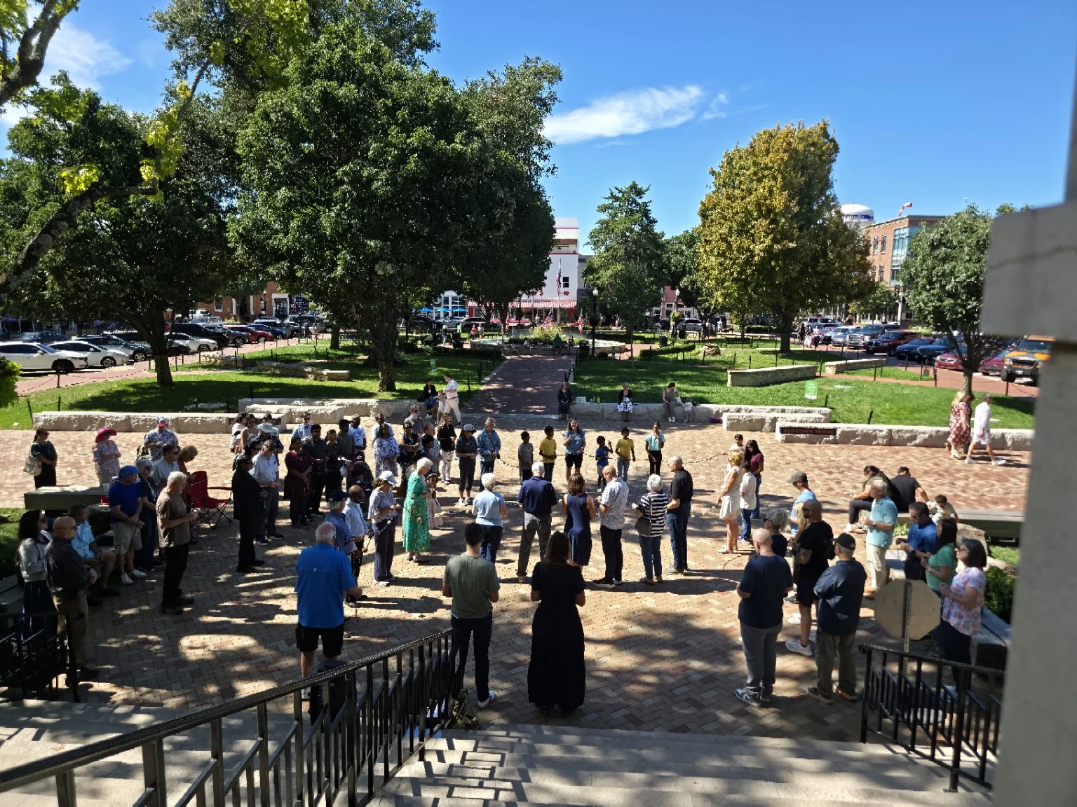View from the courthouse steps toward the prayer circle at the 2026 Bentonville Rosary Rally