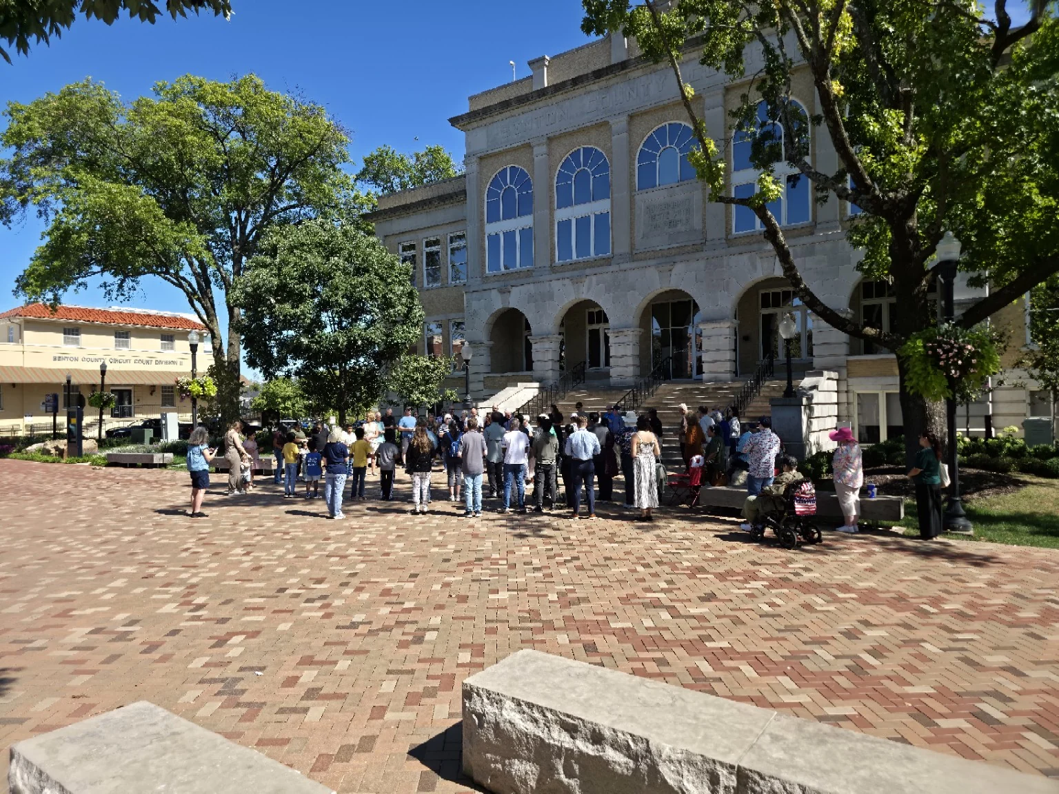 Wide civic view of the 2026 Rosary Rally in downtown Bentonville